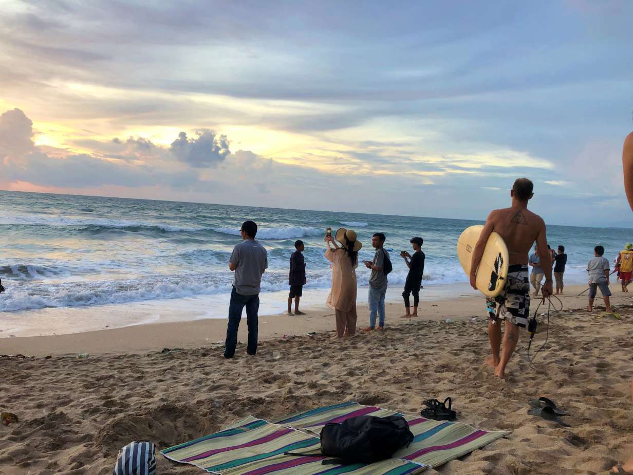 beach guest waiting for sunset