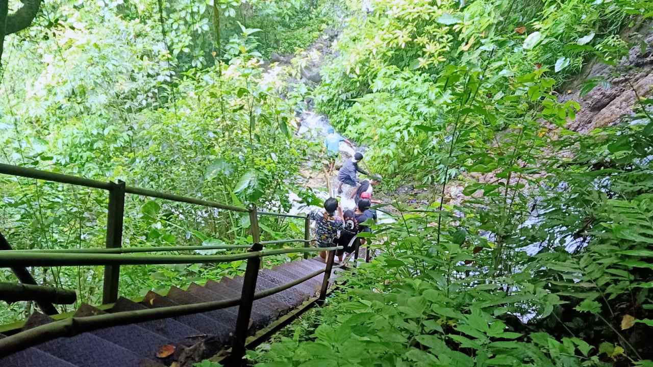 small path to coban sewu waterfall 