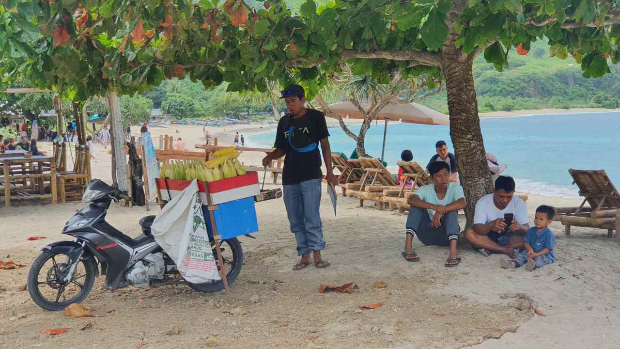 motorcycle food cart selling grilled corn 