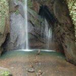 Waterfall disharge crystal clear water on summer.